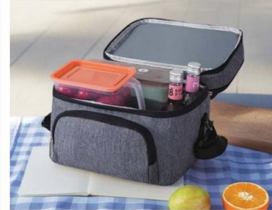 Open commuter cooler packed with bento boxes and drinks
