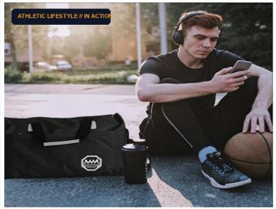 Athlete courtside with a large team holdall